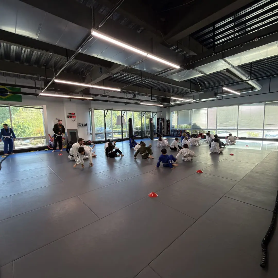 Junior Jiu-Jitsu kids class drilling on the mat at Rising Tide Hi Tech Hanover MD