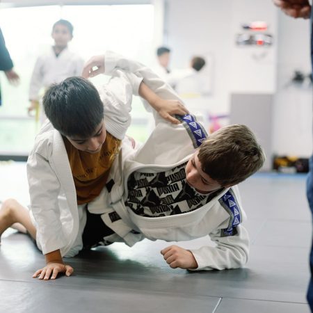 Students rolling in BJJ class at Rising Tide Hi Tech by Akbar Sayed Photography May 2025